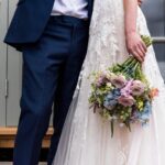 Bride and Groom with Wedding Flowers