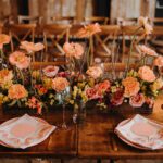 Vibrant coloured wedding flowers on a table