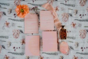 Wedding stationery in pale orange